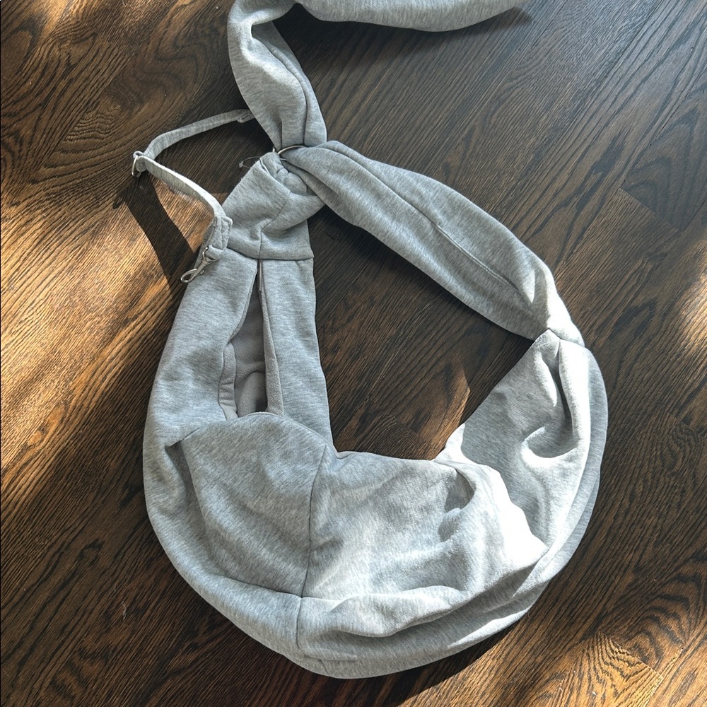 Gray dog sling carrier